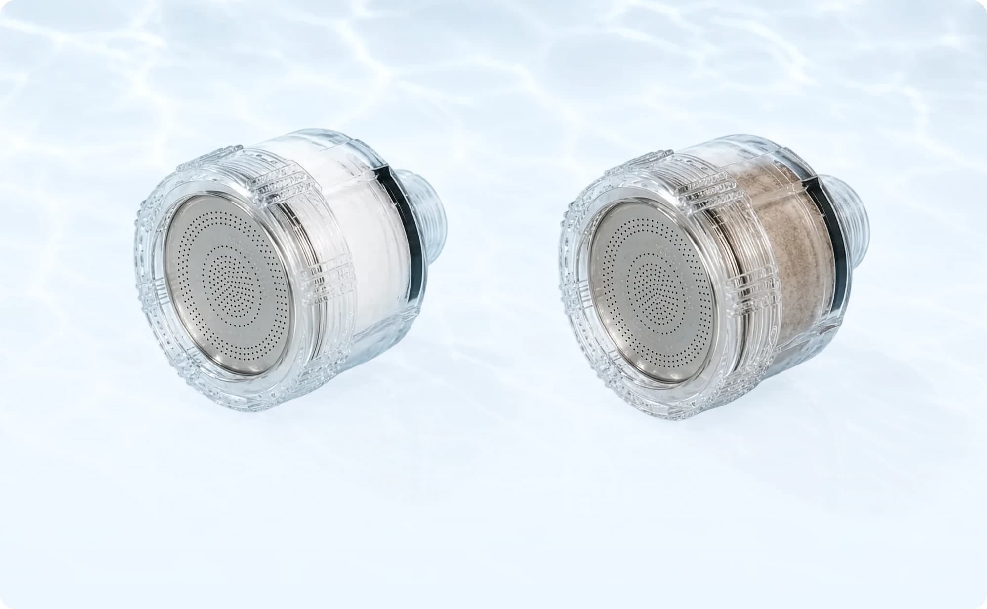 A new AQUABELL cartridge beside one darkened after two months of use