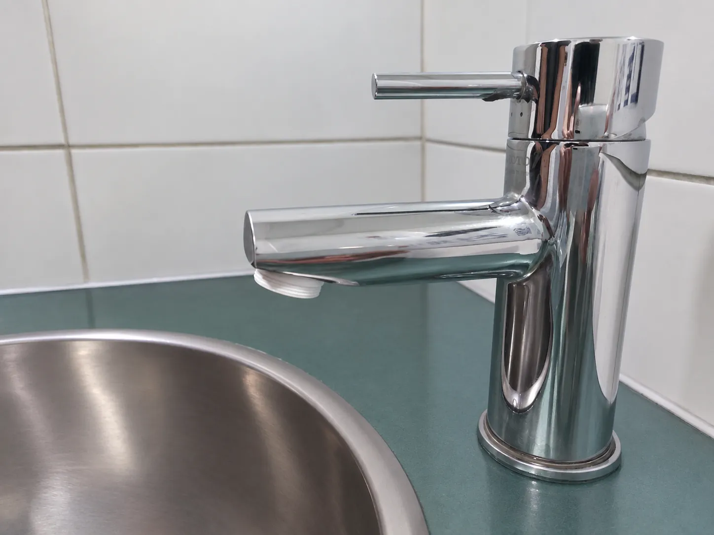 The adapter screwed onto the faucet tip